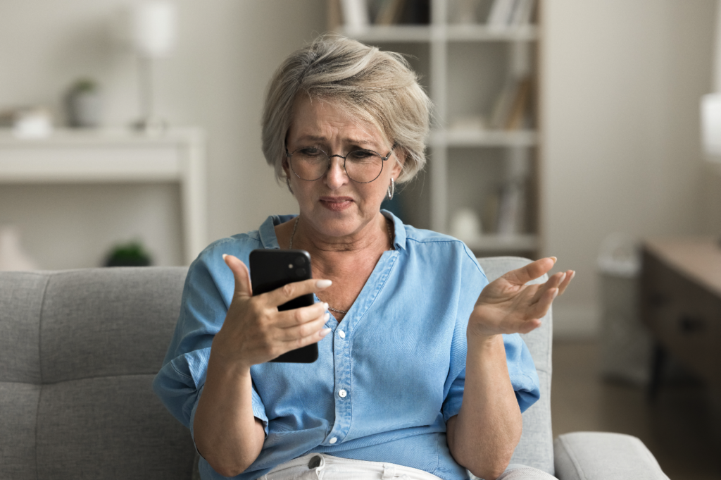 Woman frustrated with her phone